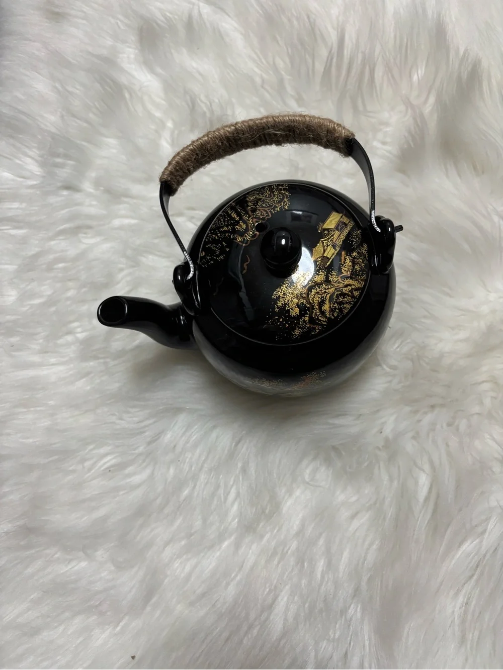 Black and Gold Ceramic Teapot with Woven Handle